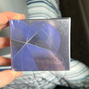 New in package Avon crystal aura perfume 1.7 fl oz